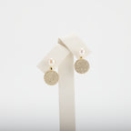 Pearl earrings on a white background
