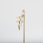 Pearl earrings on a white background