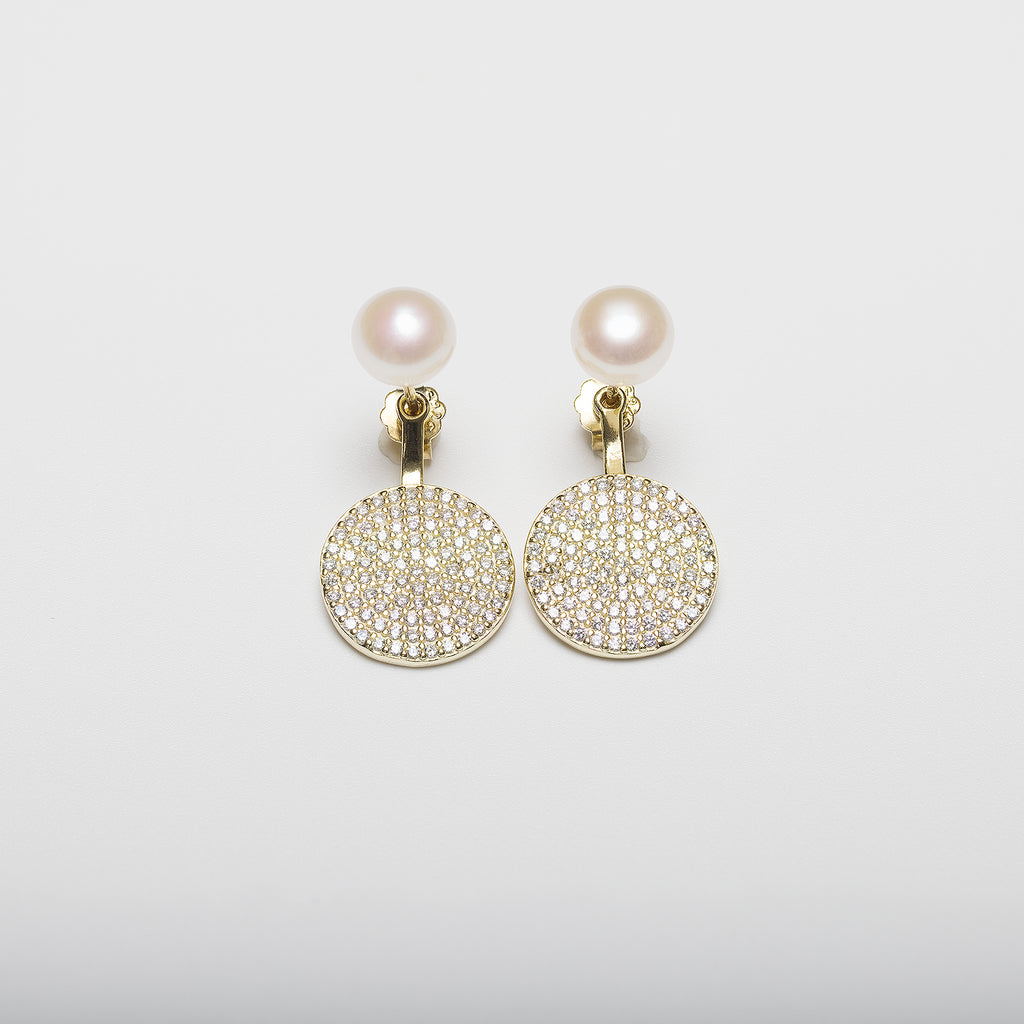 Pearl earrings on a white background