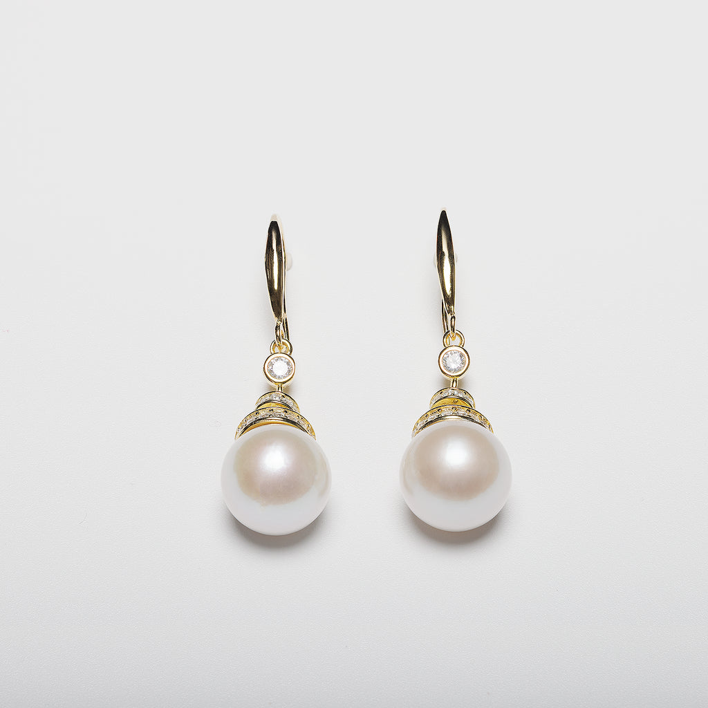 Pearl earrings on a white background
