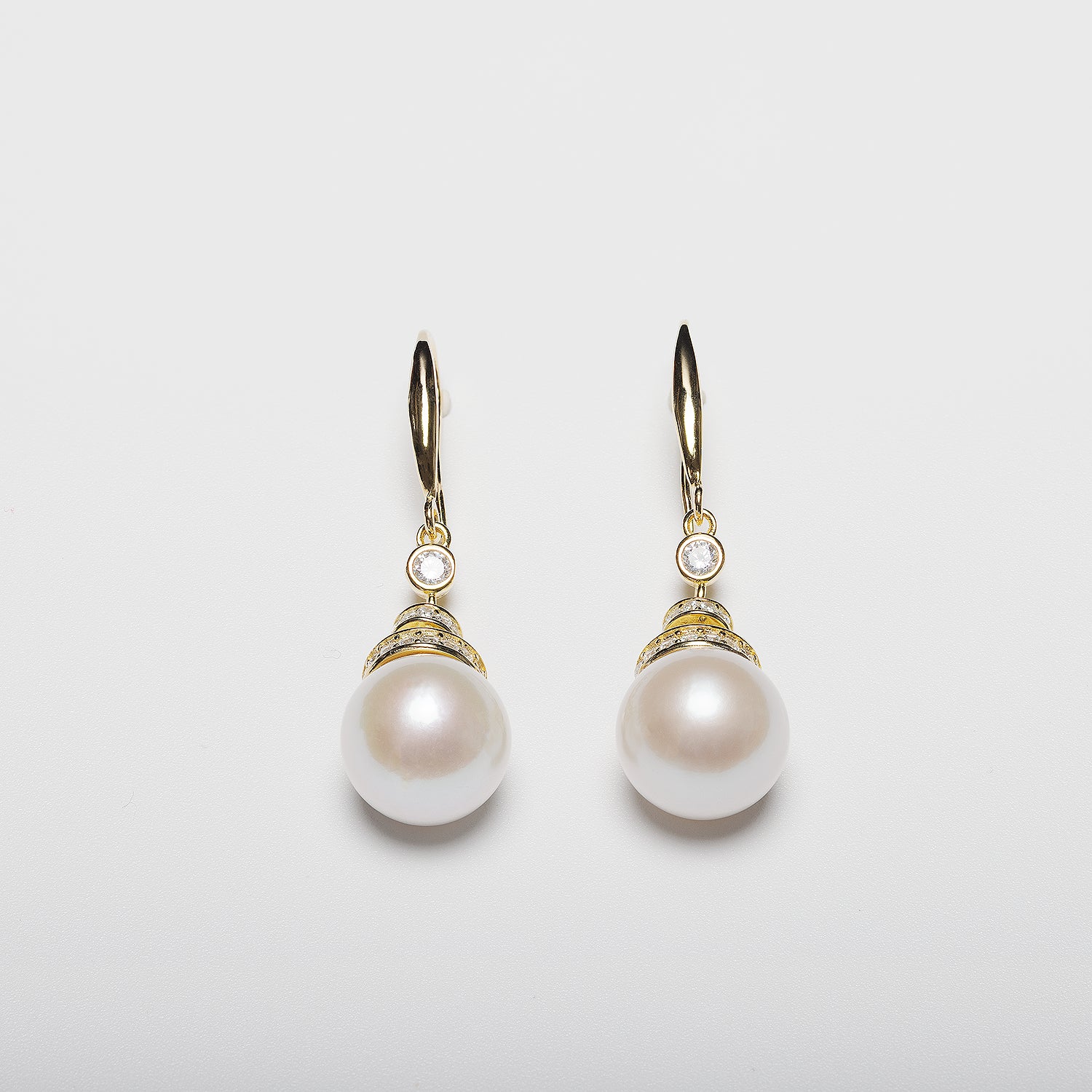 Pearl earrings on a white background