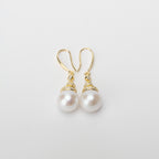 Pearl earrings on a white background