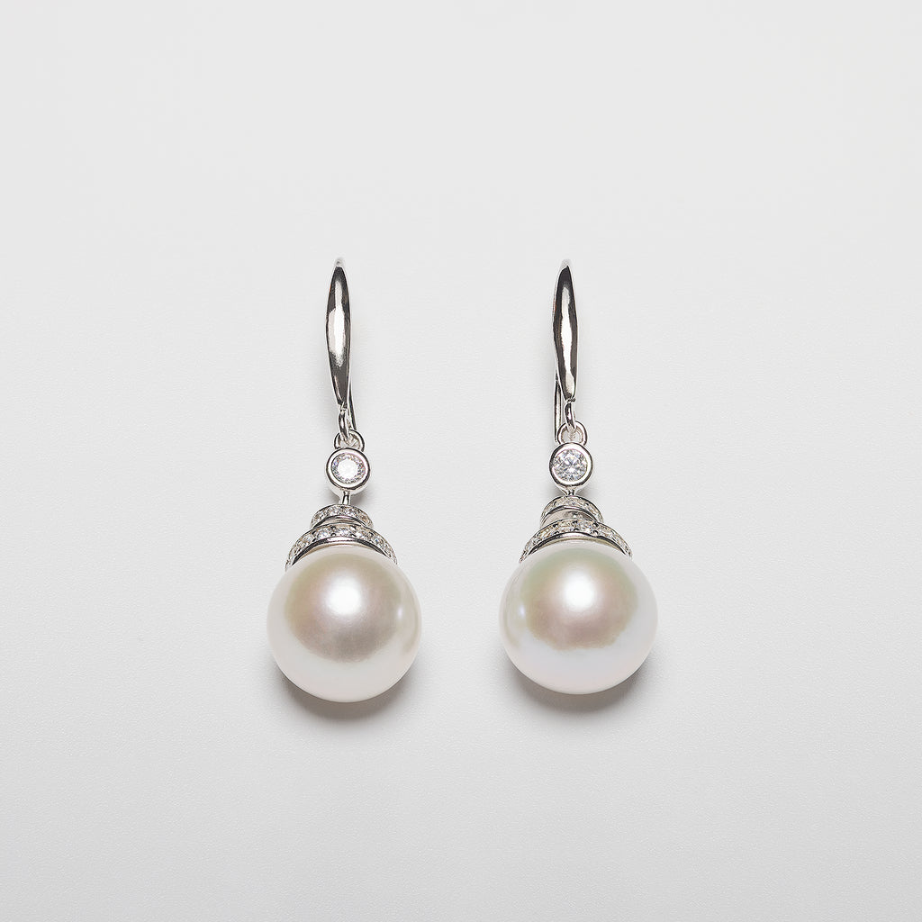 Pearl earrings on a white background