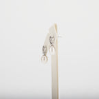 Pearl earrings on a white background