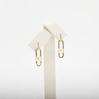 Pearl earrings on a white background