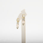 Pearl earrings on a white background