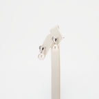 Pearl earrings on a white background