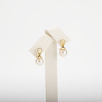 Pearl earrings on a white background
