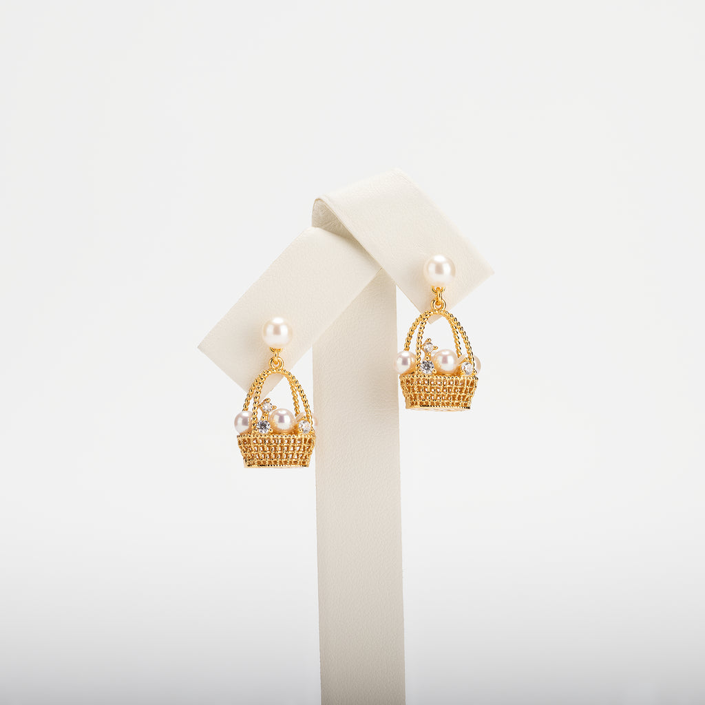 Pearl earrings on a white background