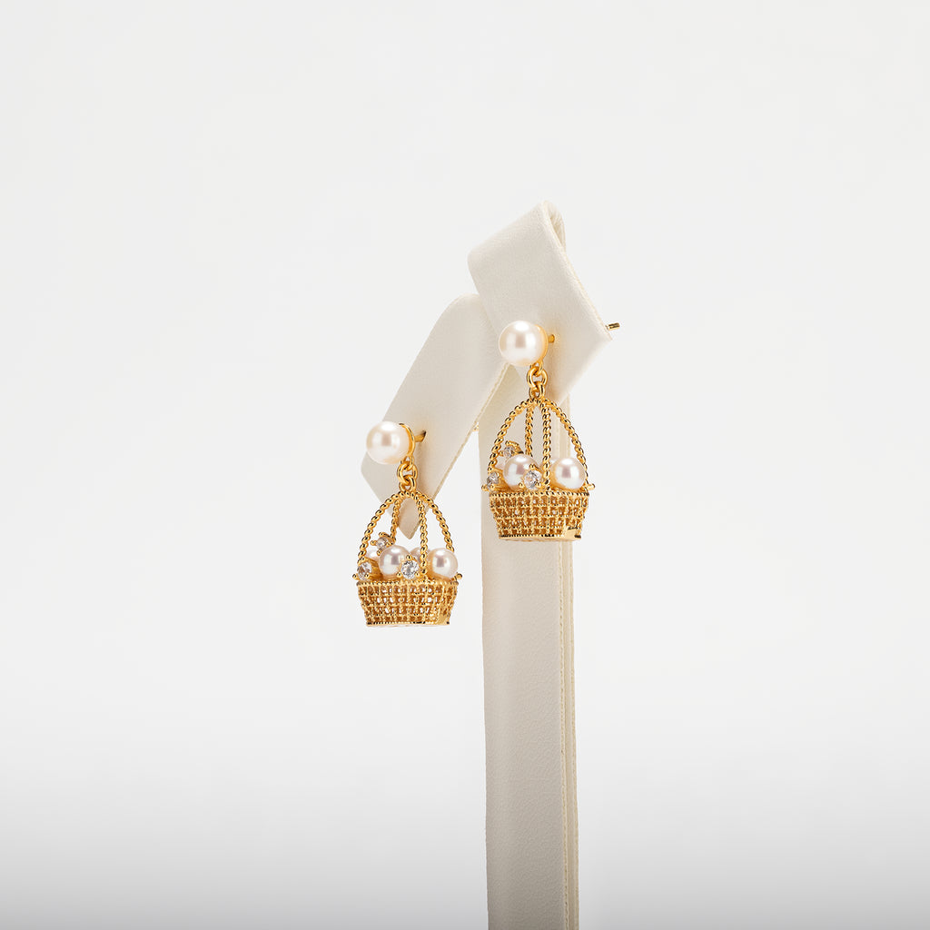 Pearl earrings on a white background