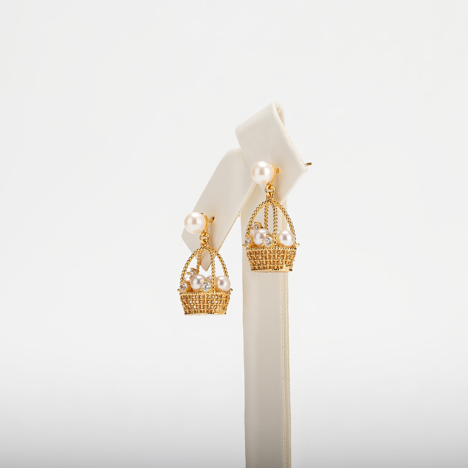 Pearl earrings on a white background
