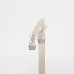 Pearl earrings on a white background