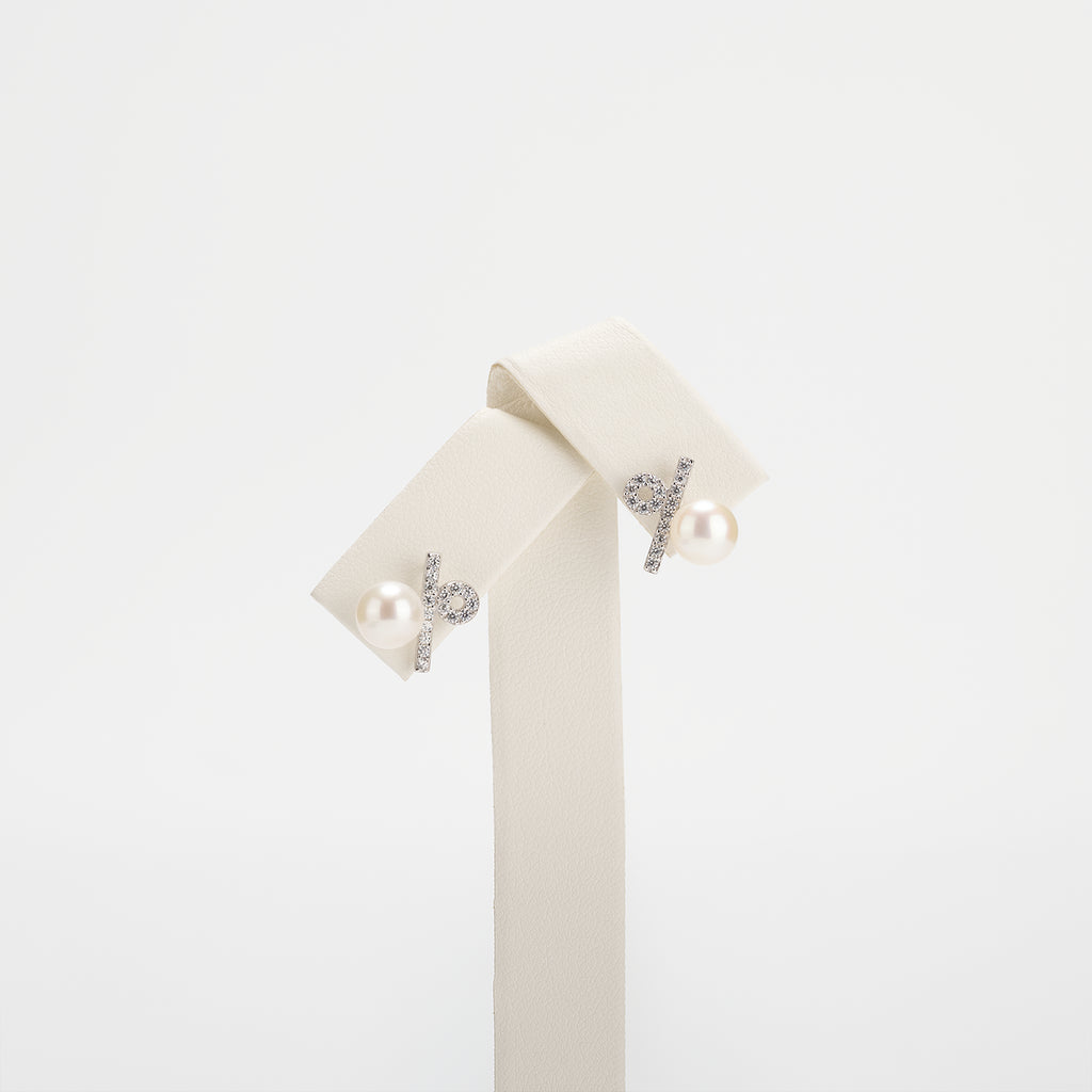 Pearl earrings on a white background