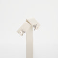 Pearl earrings on a white background