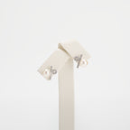 Pearl earrings on a white background