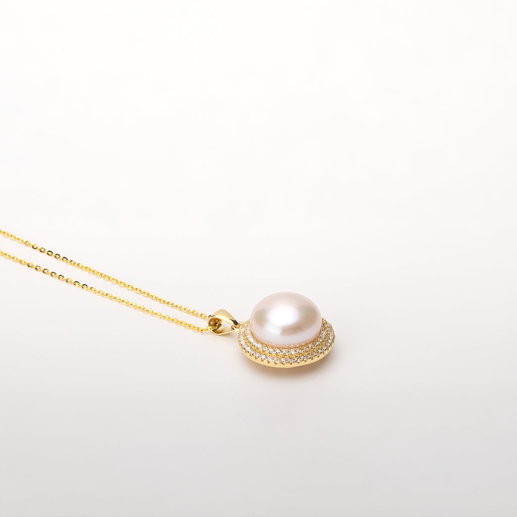Pearl  pendant necklace on a white background