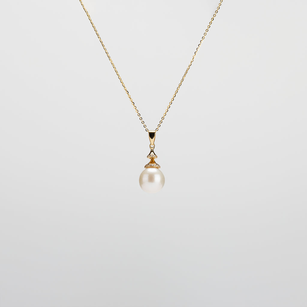 Pearl  pendant necklace on a white background