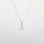 Pearl  pendant necklace on a white background