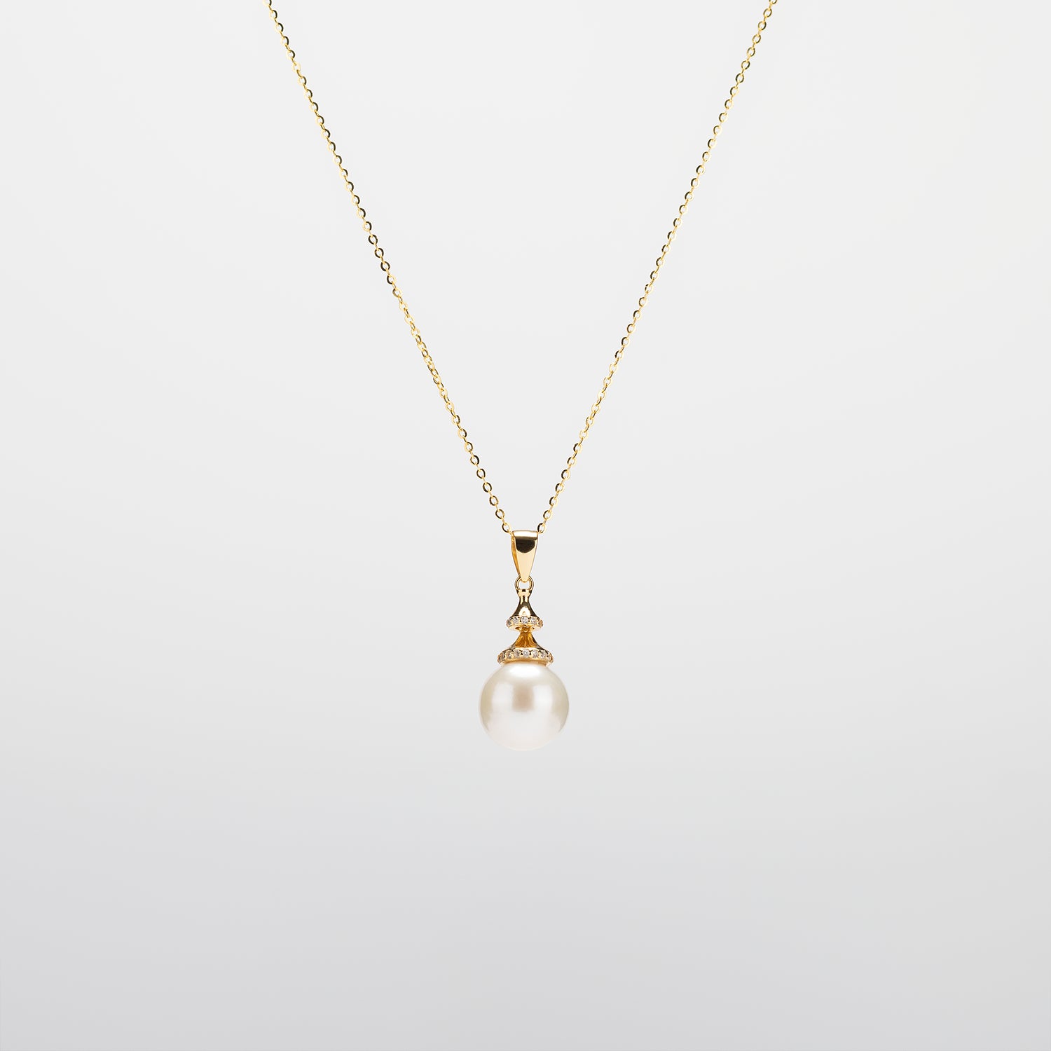 Pearl  pendant necklace on a white background