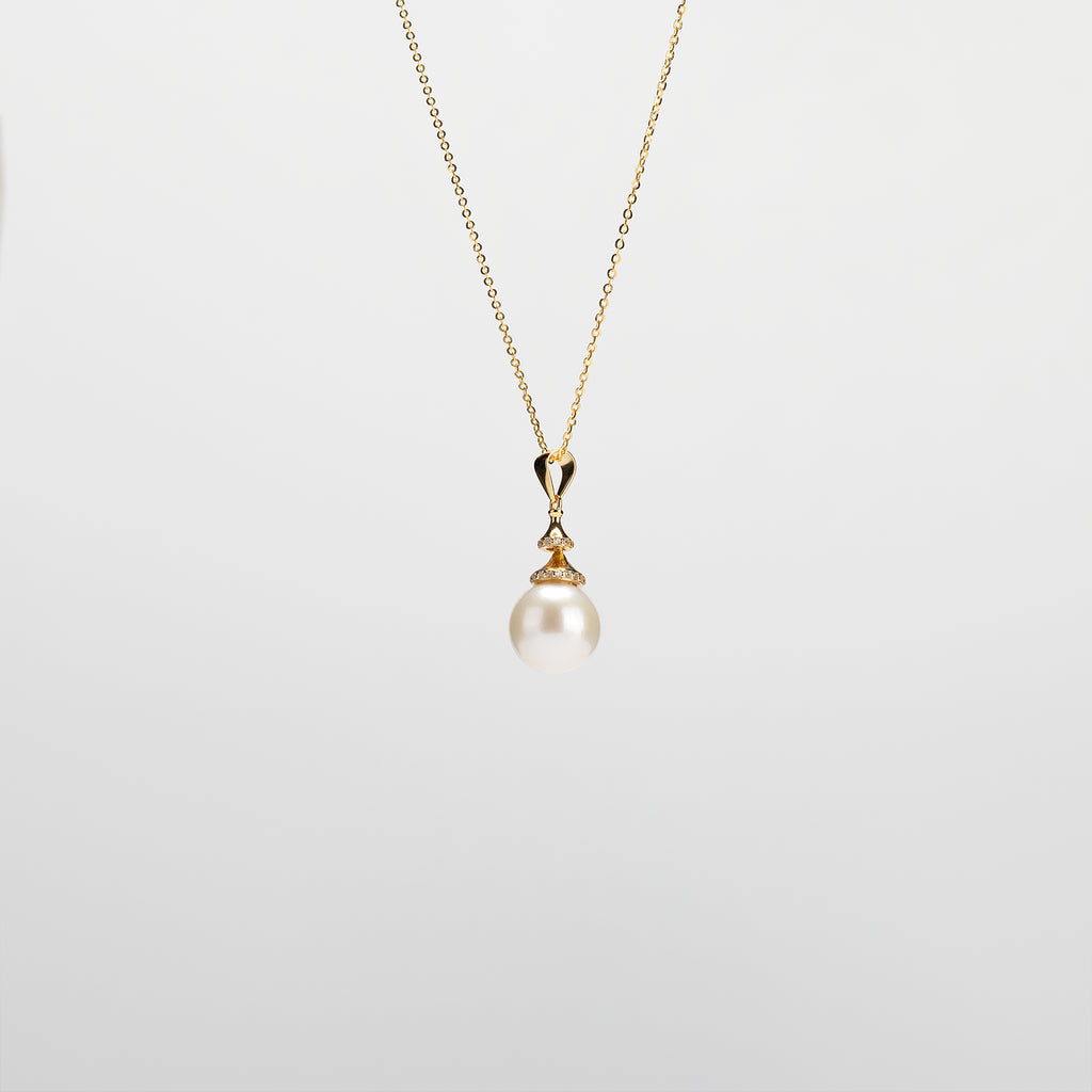 Pearl  pendant necklace on a white background