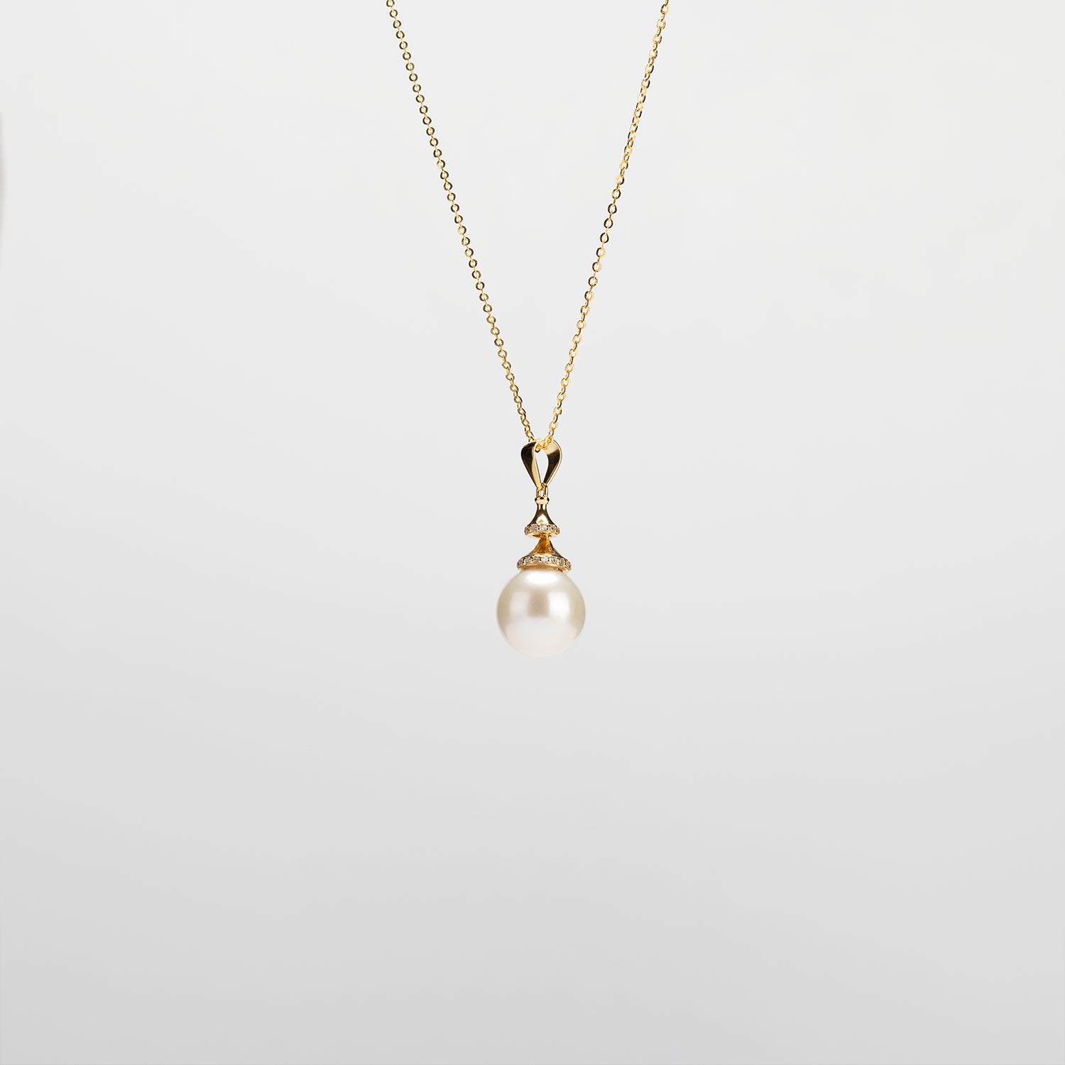 Pearl  pendant necklace on a white background