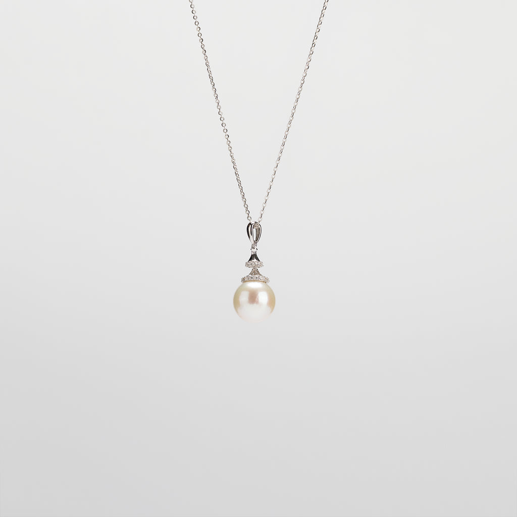 Pearl  pendant necklace on a white background
