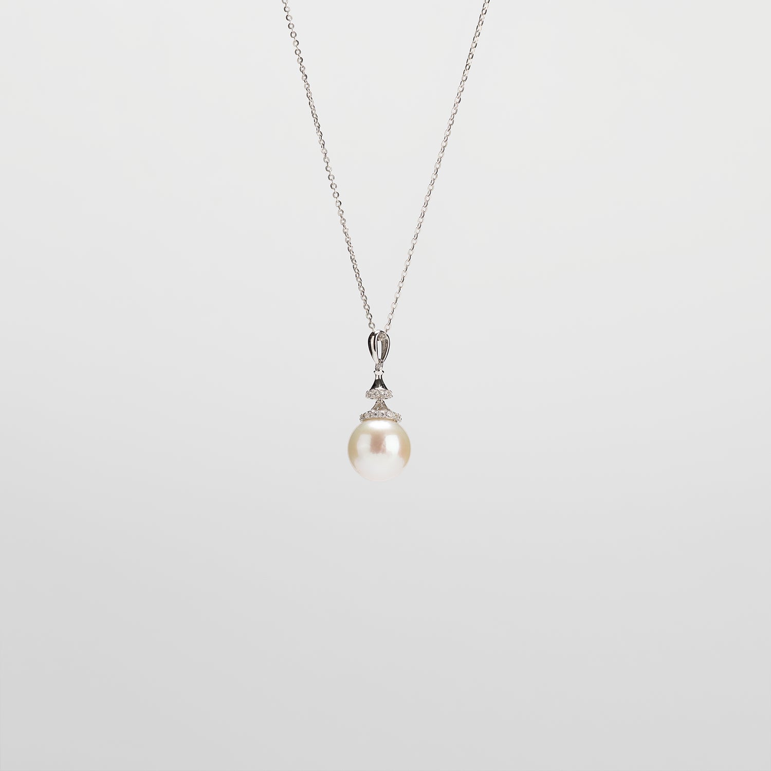 Pearl  pendant necklace on a white background