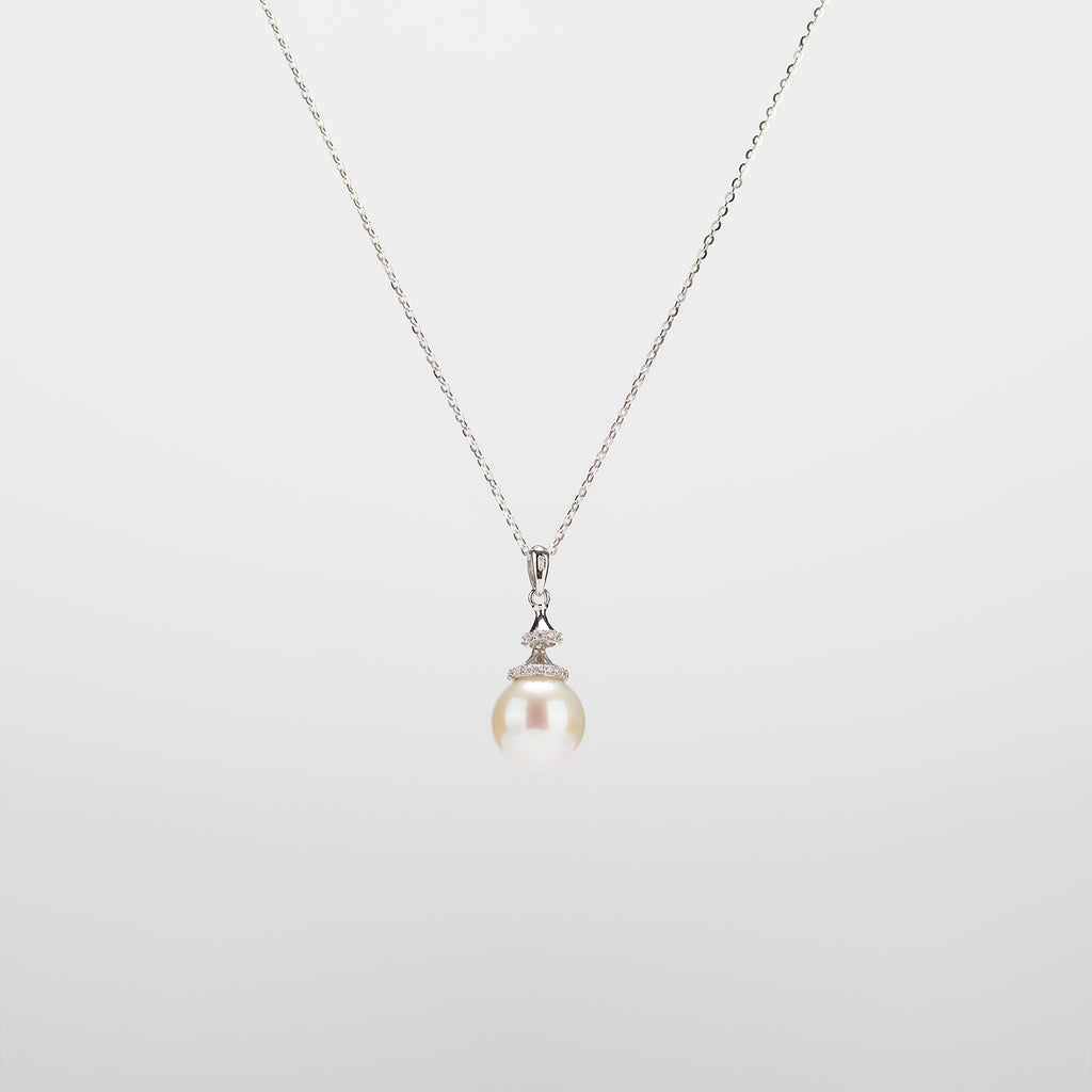 Pearl  pendant necklace on a white background