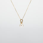 Pearl  pendant necklace on a white background