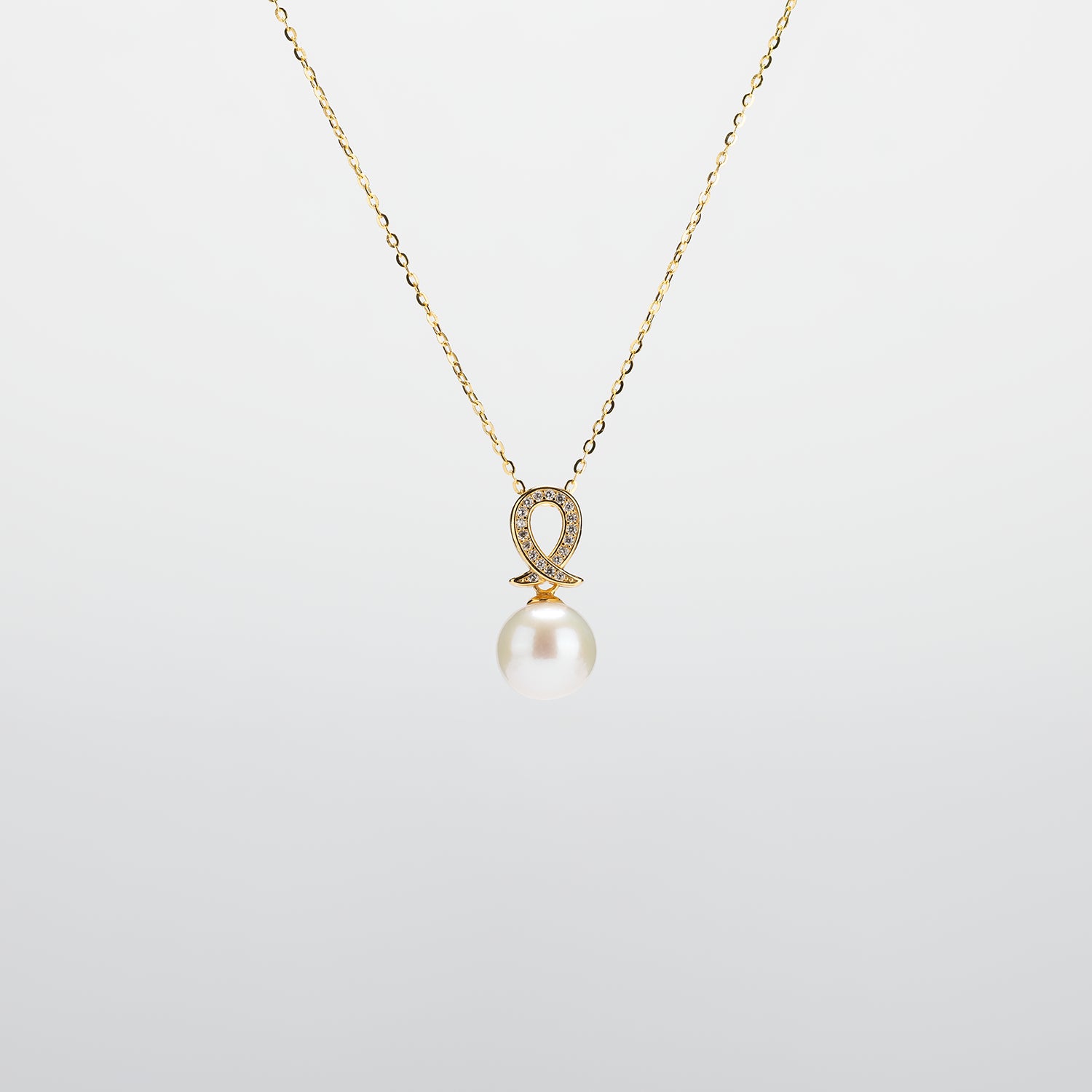 Pearl  pendant necklace on a white background