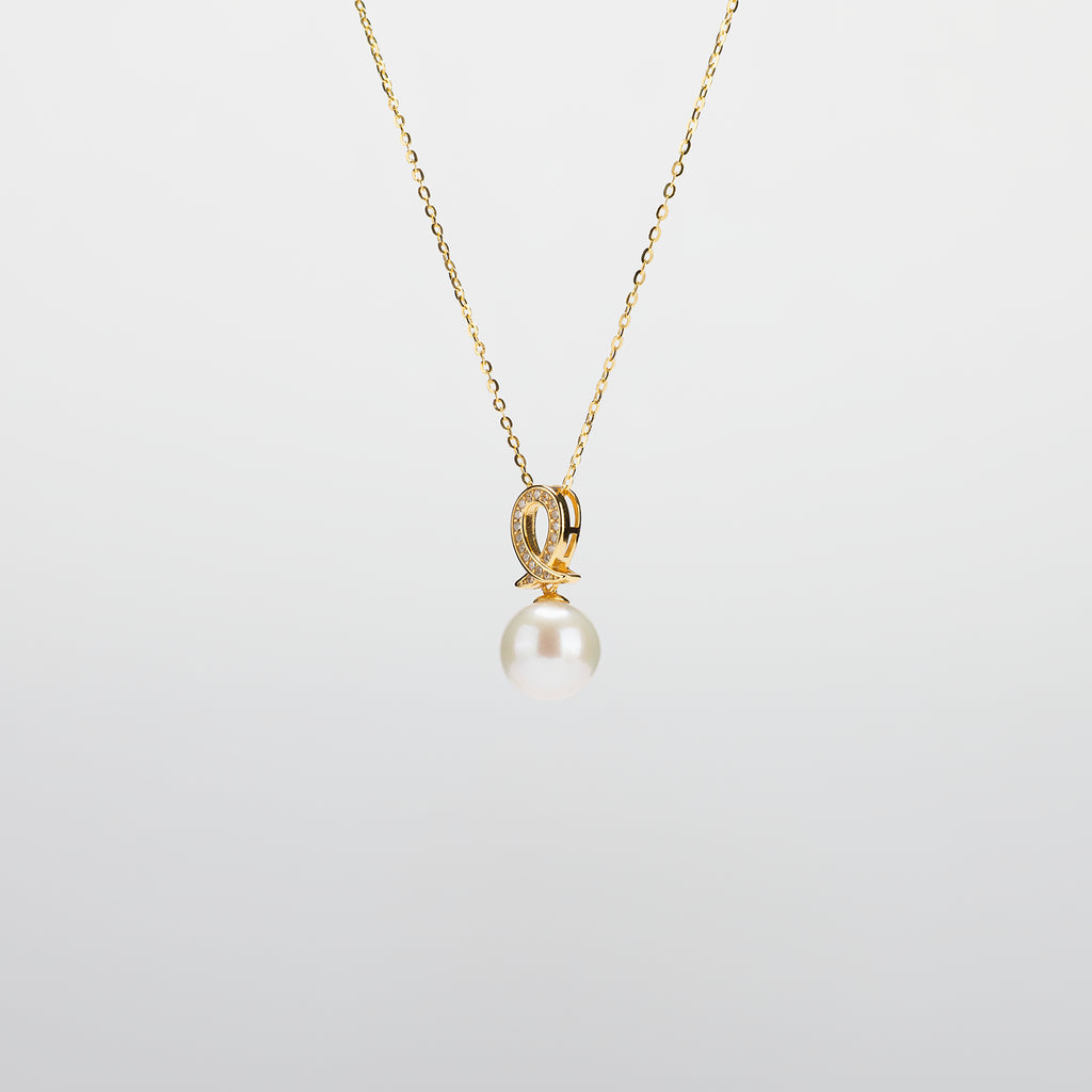 Pearl  pendant necklace on a white background