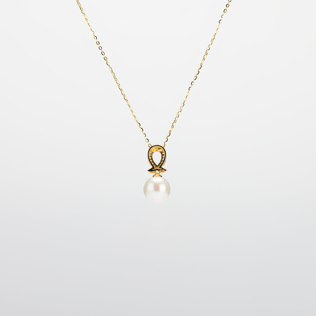 Pearl  pendant necklace on a white background
