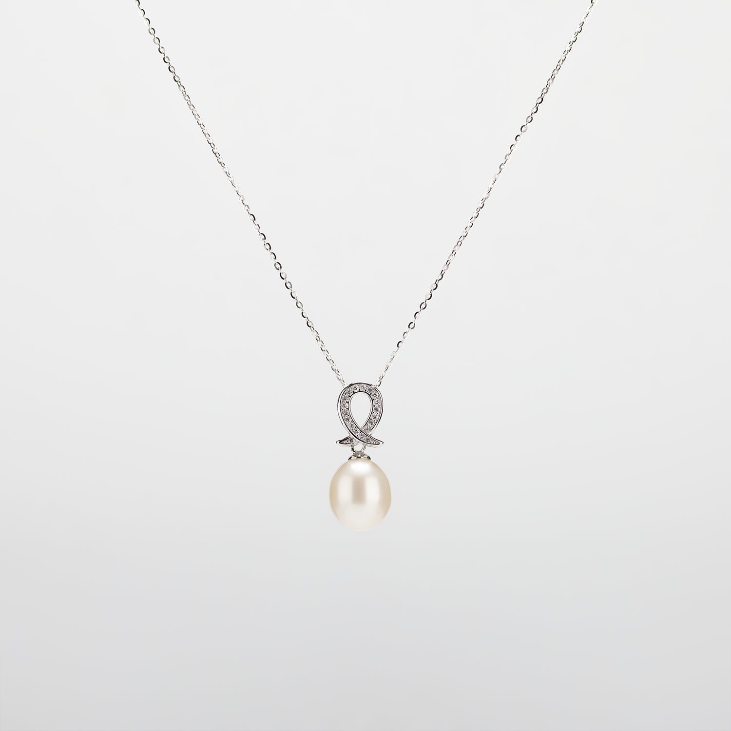 Pearl  pendant necklace on a white background