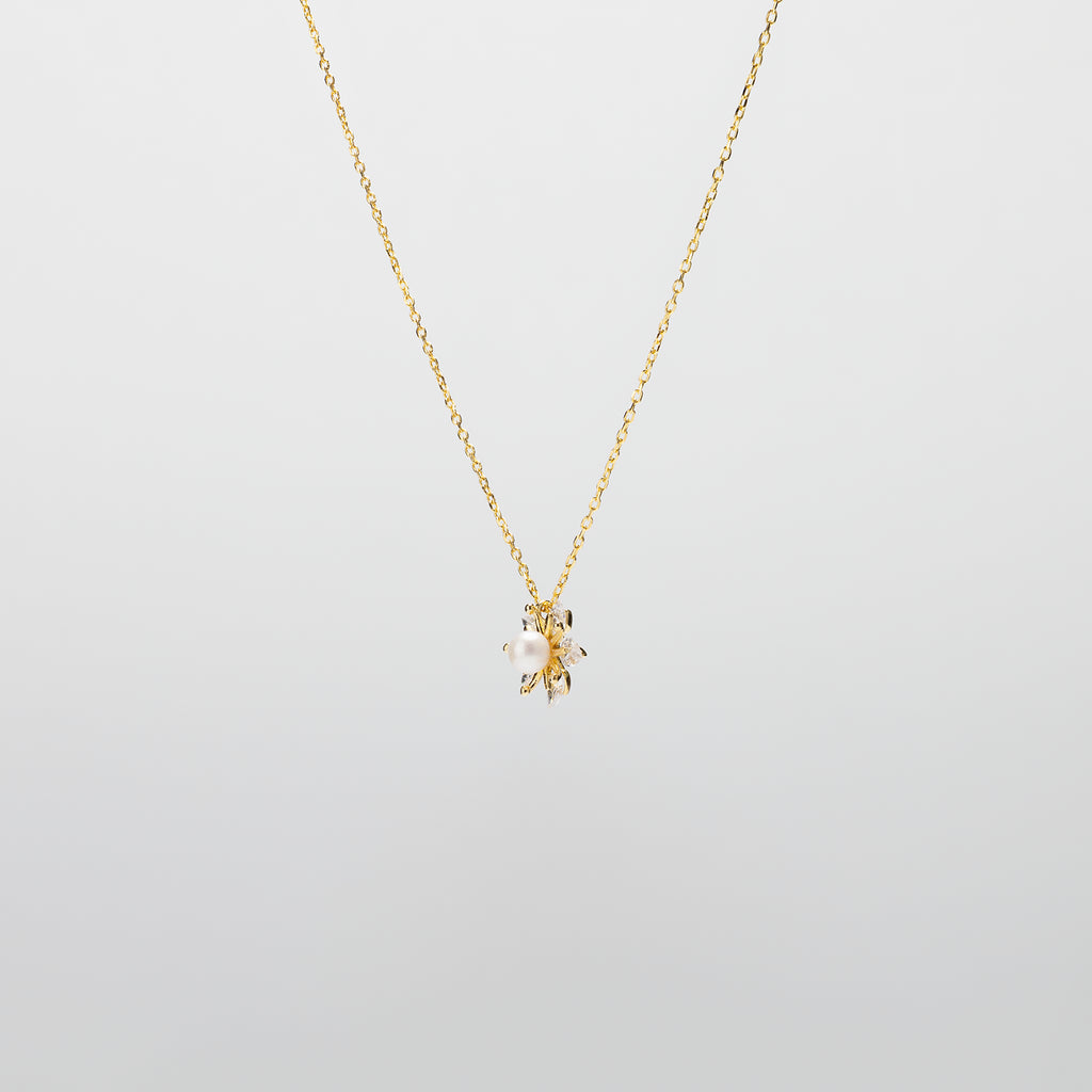 Pearl  pendant necklace on a white background