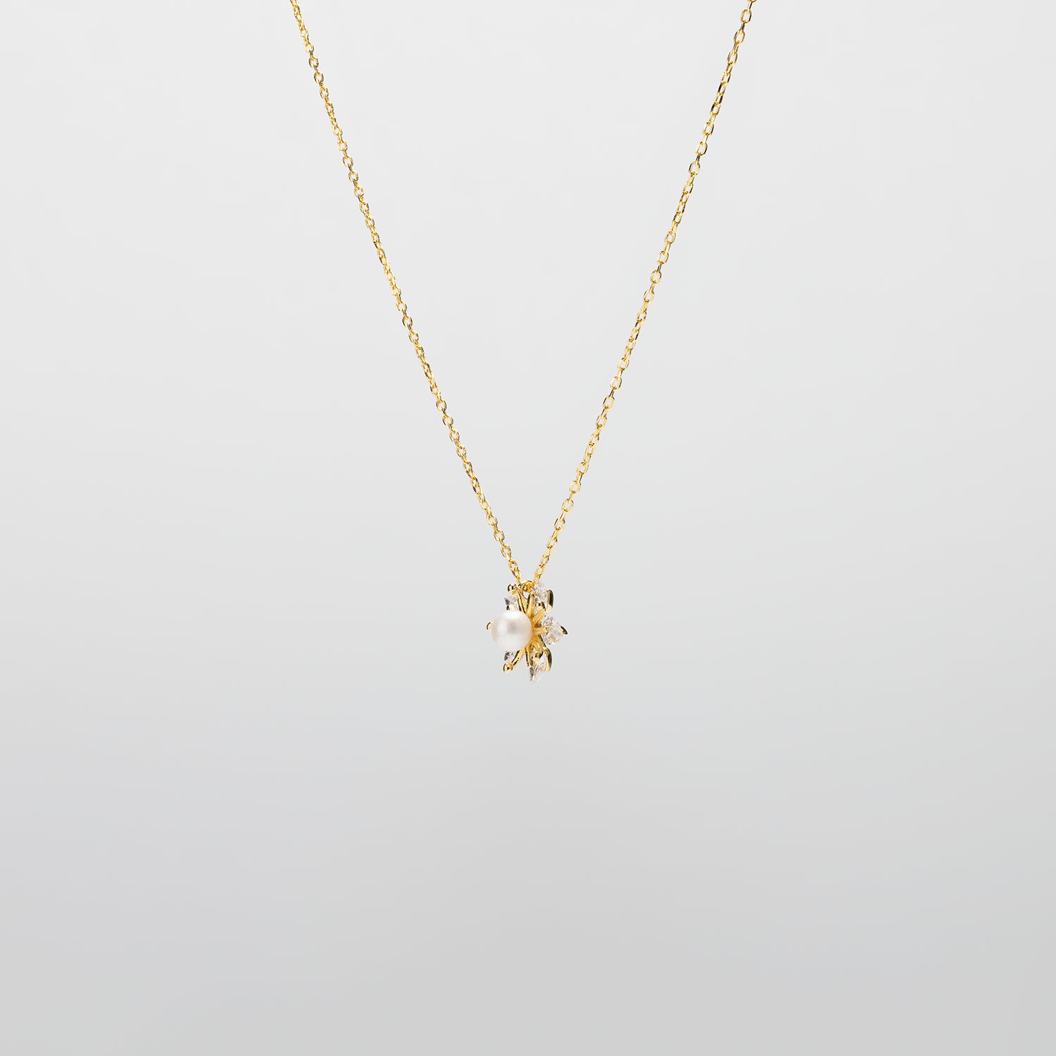 Pearl  pendant necklace on a white background