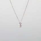 Pearl  pendant necklace on a white background