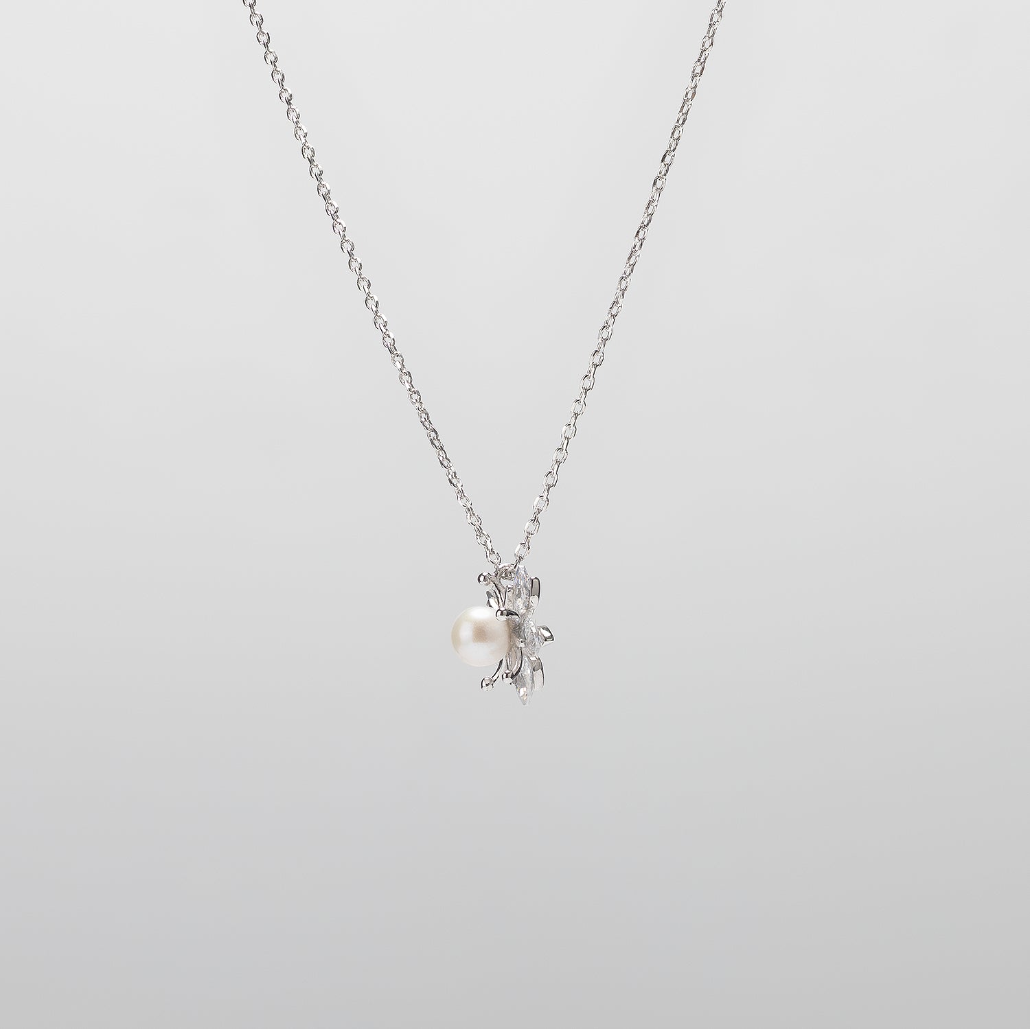 Pearl  pendant necklace on a white background