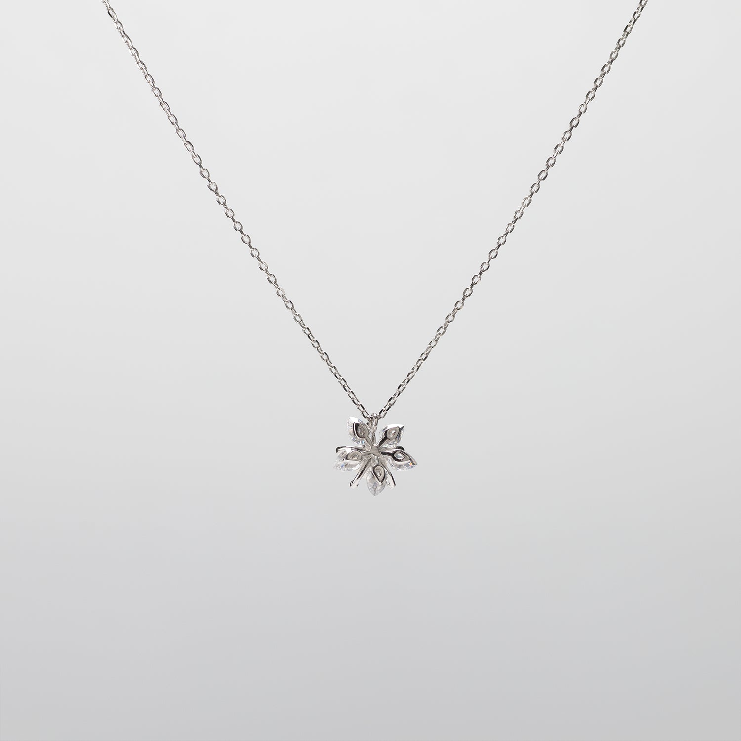 Pearl  pendant necklace on a white background