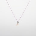 Pearl  pendant necklace on a white background