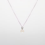Pearl  pendant necklace on a white background