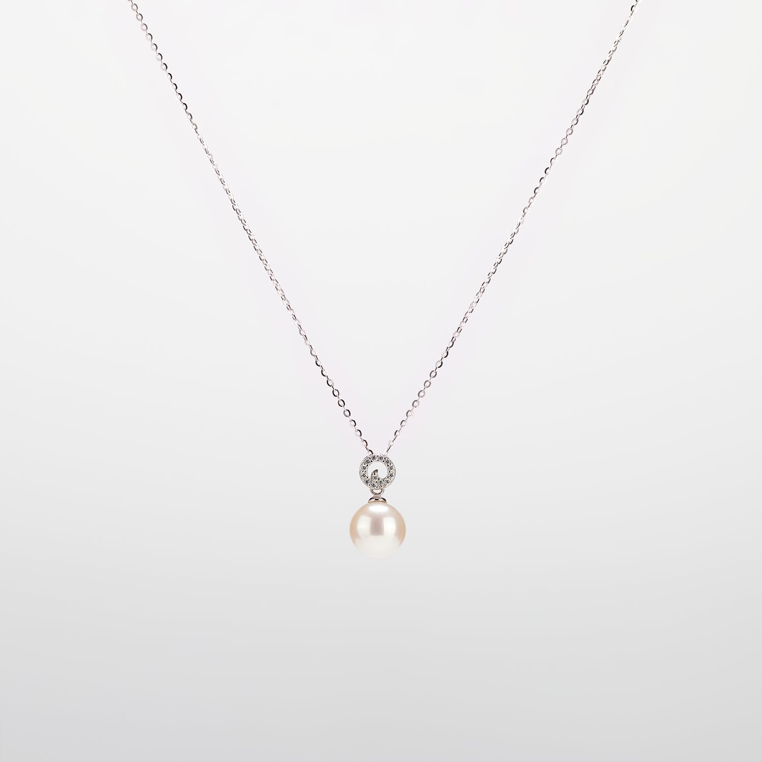 Pearl  pendant necklace on a white background
