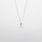Pearl  pendant necklace on a white background