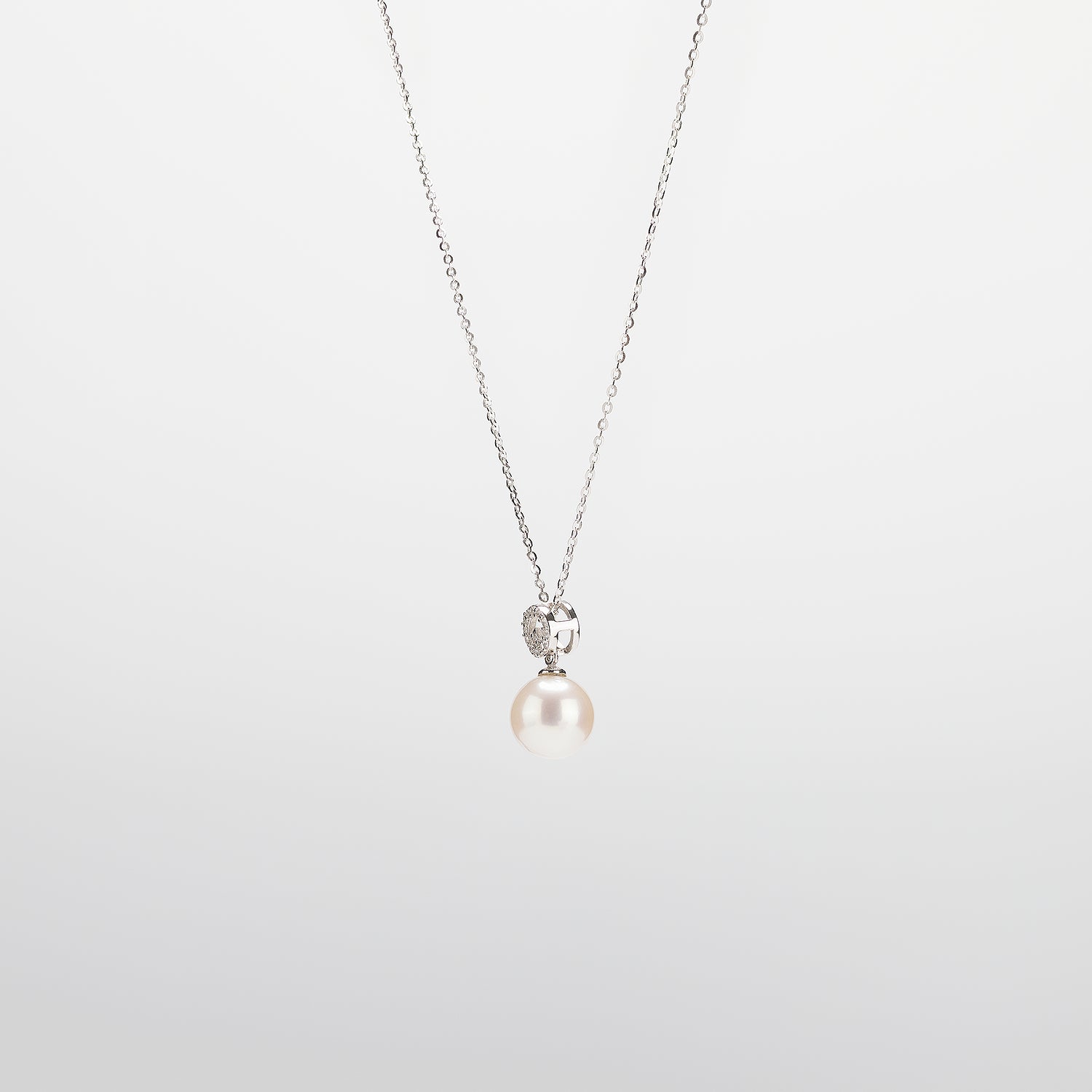 Pearl  pendant necklace on a white background