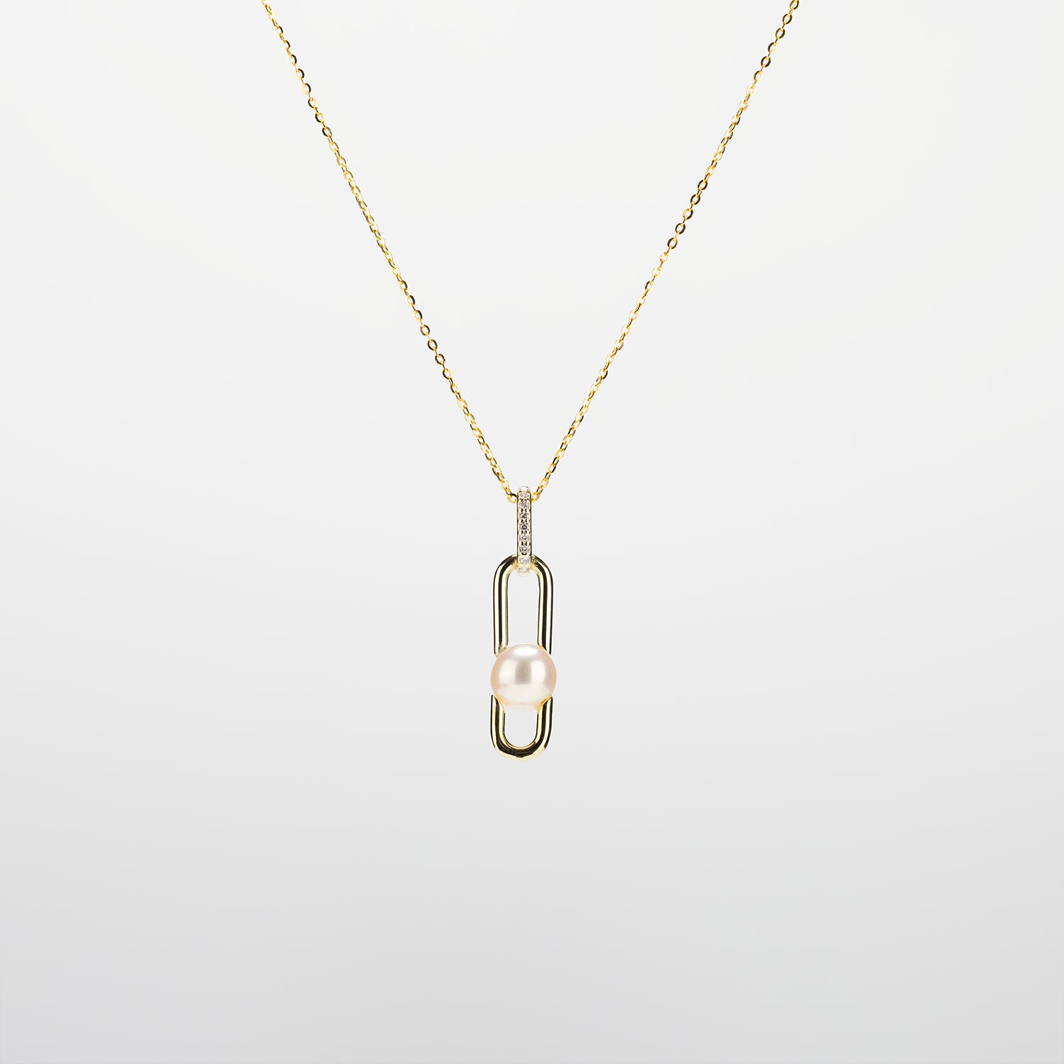 Pearl  pendant necklace on a white background