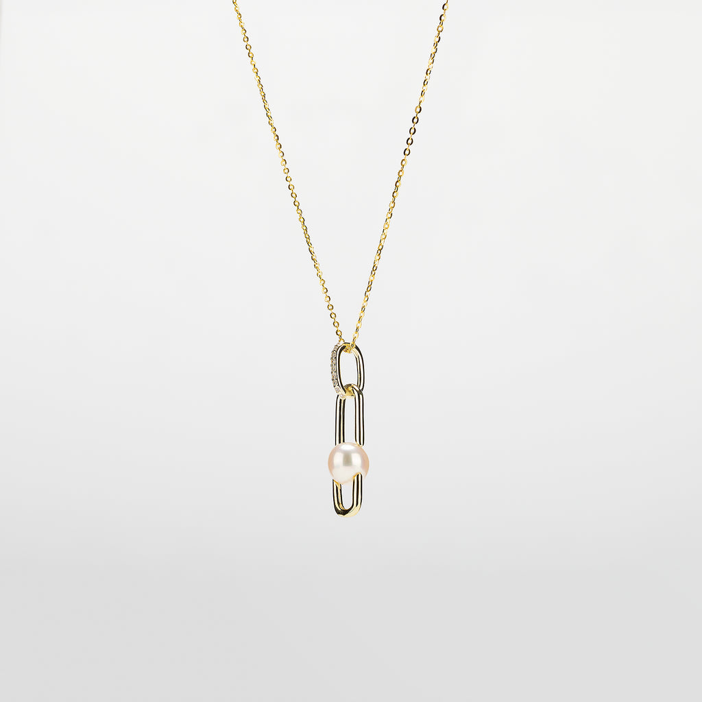Pearl  pendant necklace on a white background