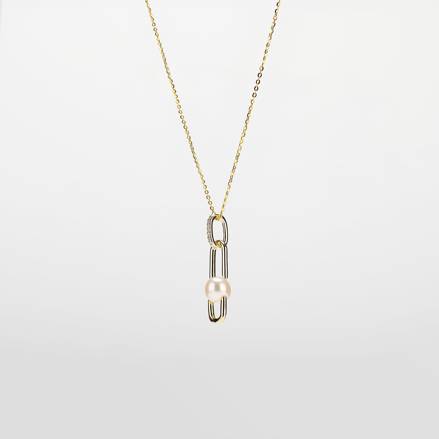 Pearl  pendant necklace on a white background
