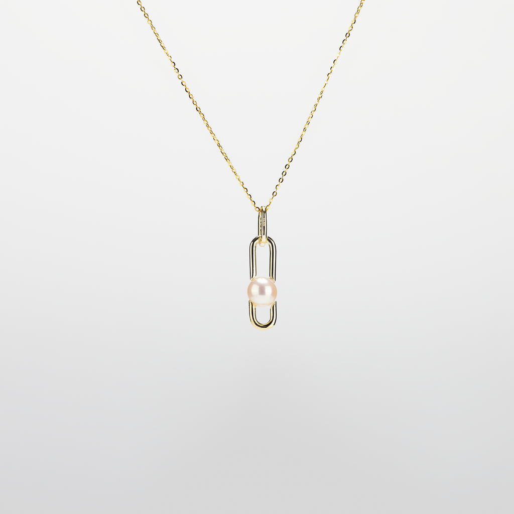 Pearl  pendant necklace on a white background