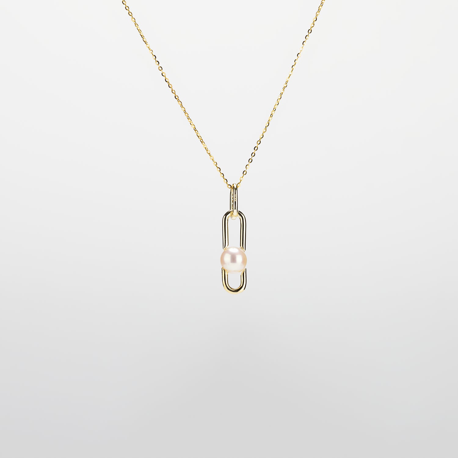 Pearl  pendant necklace on a white background