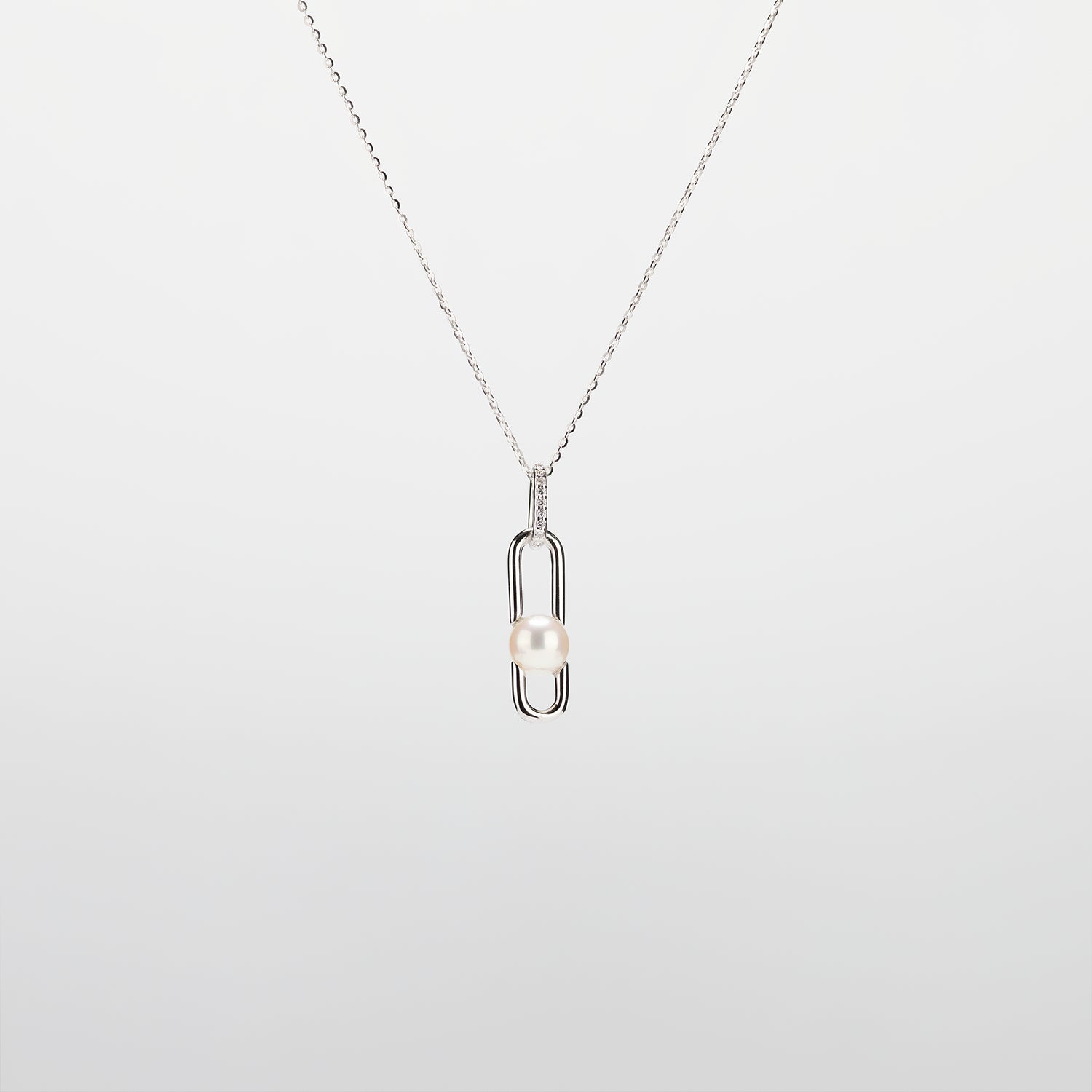 Pearl  pendant necklace on a white background