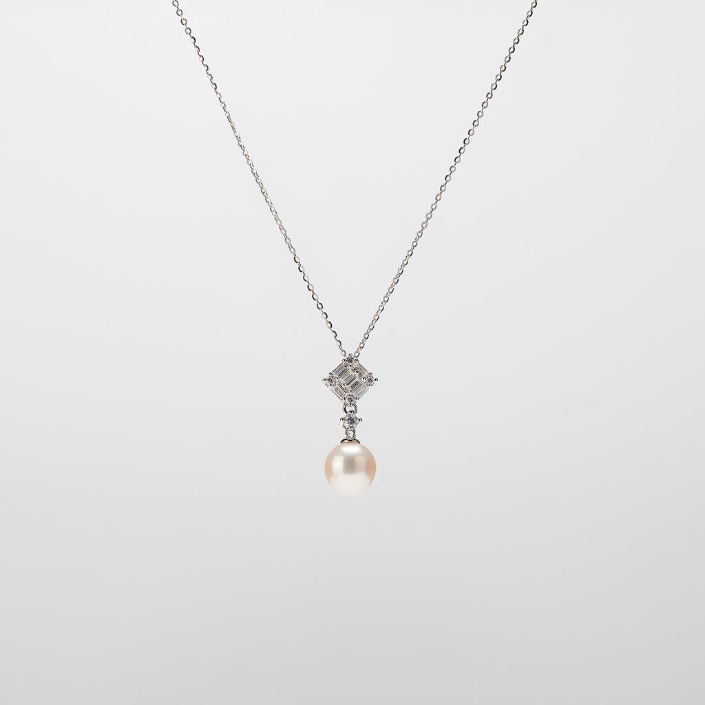 Pearl  pendant necklace on a white background